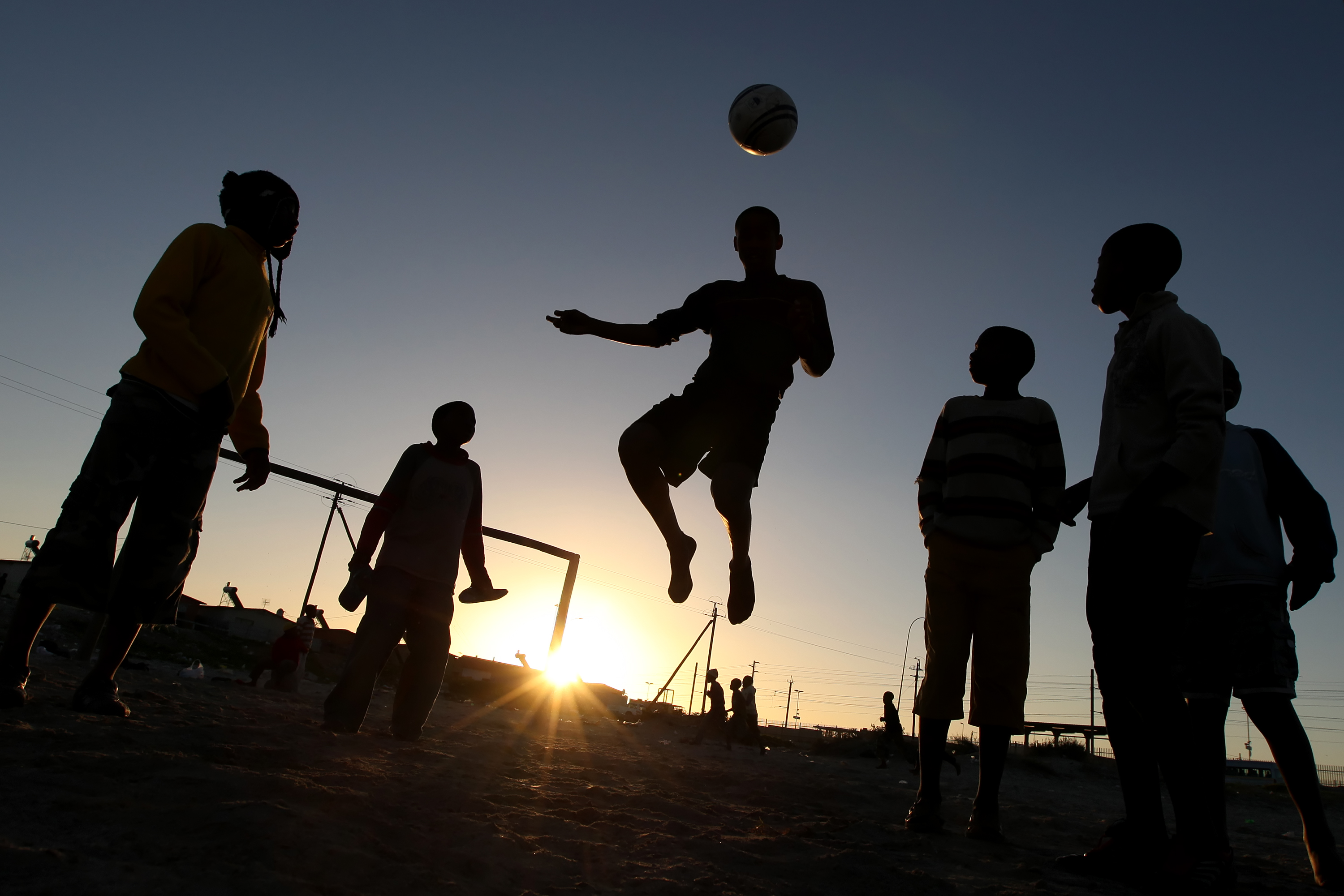 She doesn t play football. Спорт в Африке. People playing Football. Играющие люди на Бэкграунд. People Football.