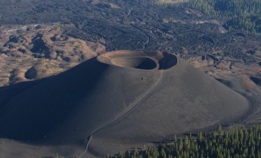 How do cinder-cone volcanoes erupt?