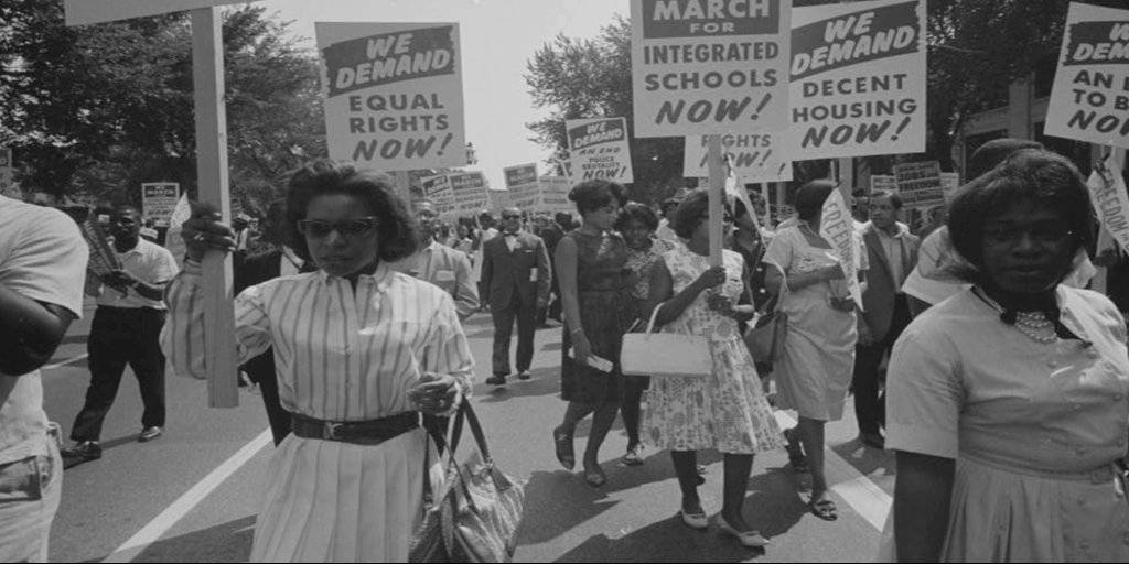 Image result for a large pro-suffrage march took place