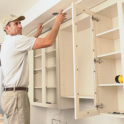 Part of the installation. Установка cabinet. cabinet making and installation. installing built-in cabinetry. cabinet installer logo.
